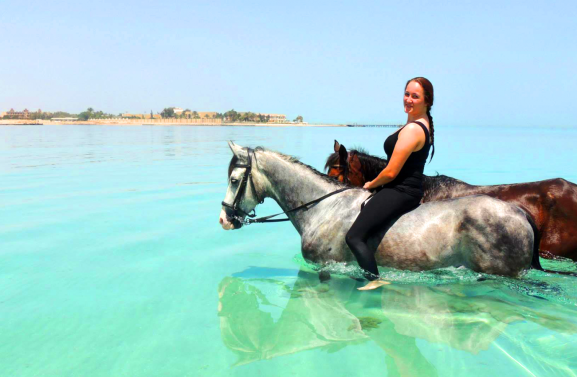 girl2horsesswimming 1600x900